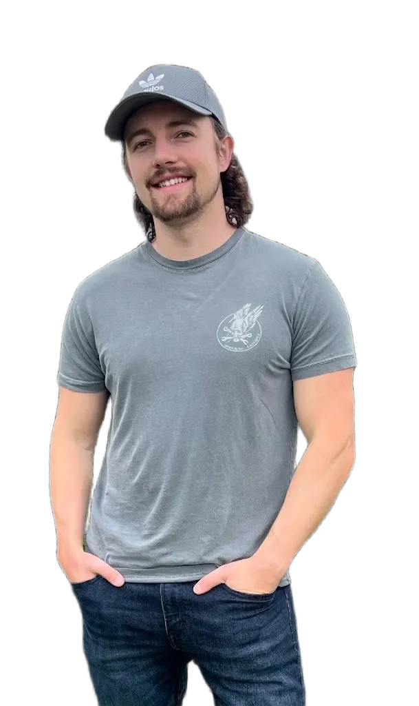 Sholtix founder Danny, smiling with hands in his pockets